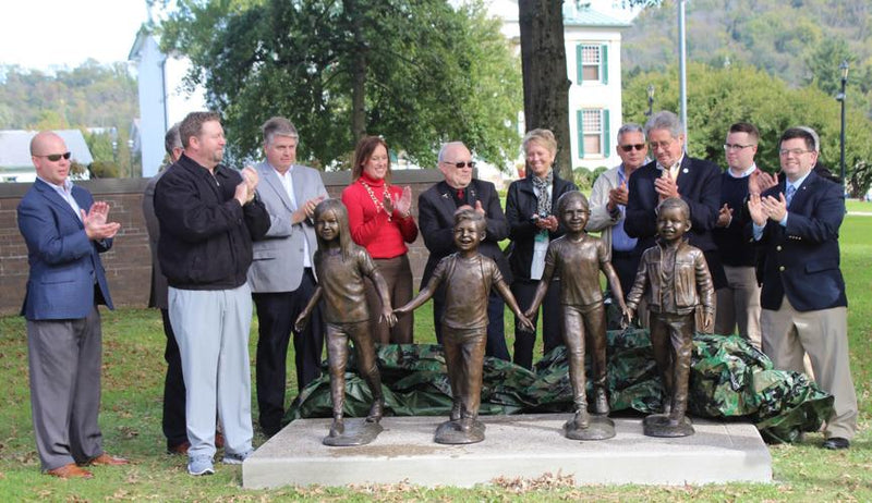 Children's Bronze School Statue Unveiled