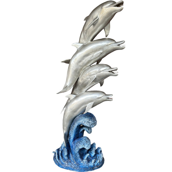 four-swimming-dolphins-