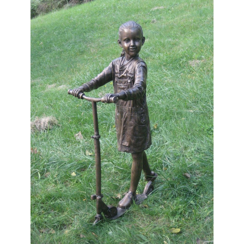 Statue of Girl Riding a Scooter - Randolph Rose Collection