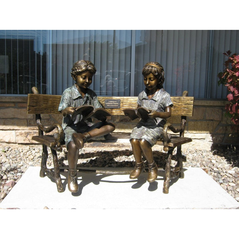 Bronze Statue of Boy and Girl Reading a Book