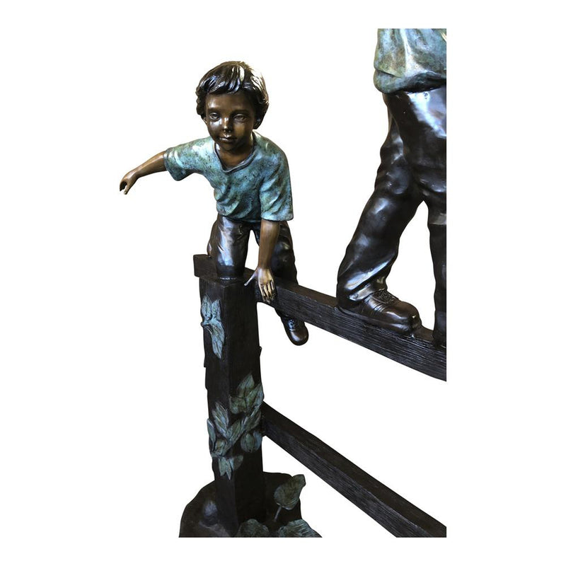 Three Boys Bronze Statue Playing on Fence