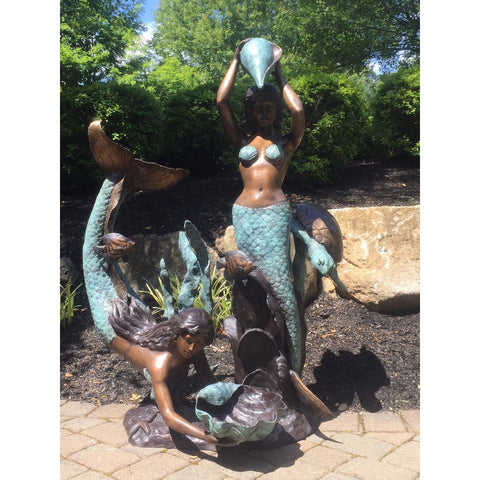 Mermaids Collecting Seashells