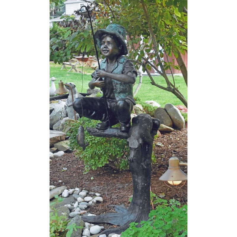 Bronze Statue of a Boy Fishing with a Dog