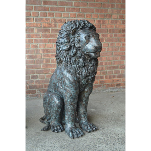 Pair of Sitting Bronze Lion Statues
