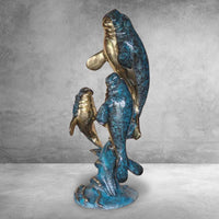 Bronze Three Swimming Manatees Statue