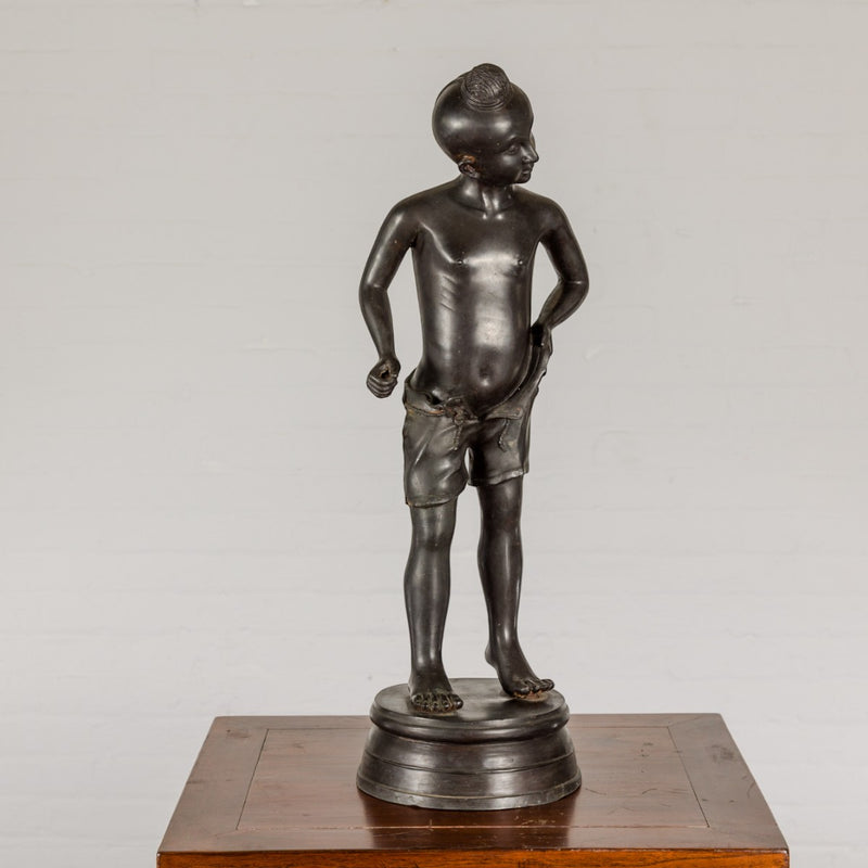 Young Boy Bronze Tabletop Statuette in Dark Patina
