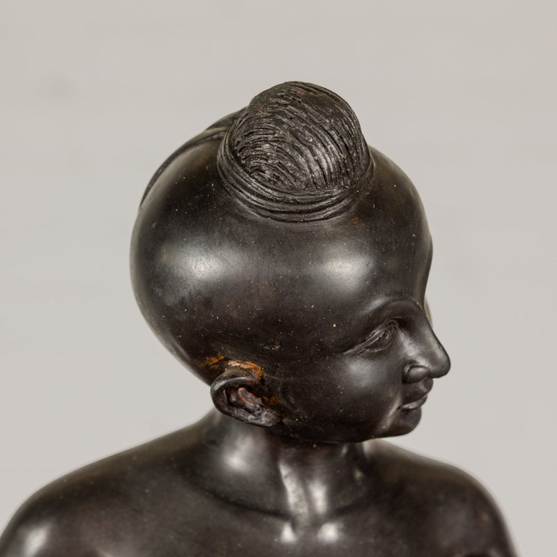 Young Boy Bronze Tabletop Statuette in Dark Patina