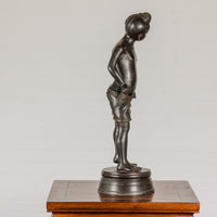 Young Boy Bronze Tabletop Statuette in Dark Patina