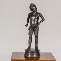 Young Boy Bronze Tabletop Statuette in Dark Patina