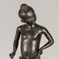 Young Boy Bronze Tabletop Statuette in Dark Patina