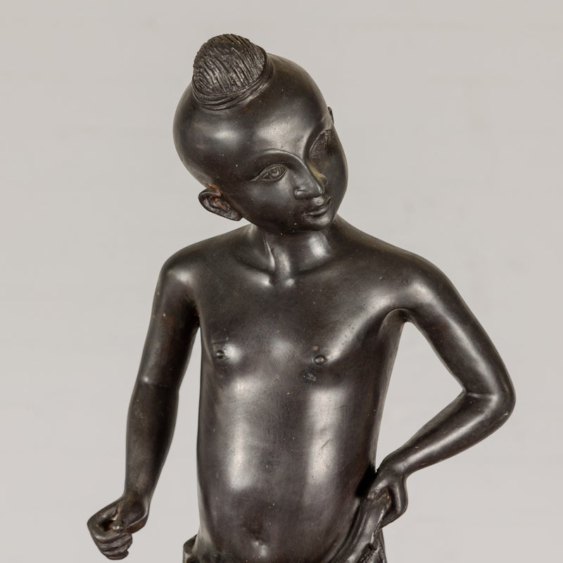 Young Boy Bronze Tabletop Statuette in Dark Patina