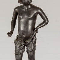 Young Boy Bronze Tabletop Statuette in Dark Patina