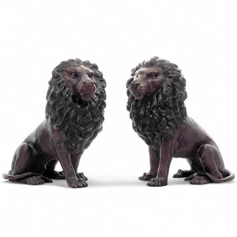 Sitting Lions with Turned Heads