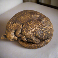 Curled up Cat Statue