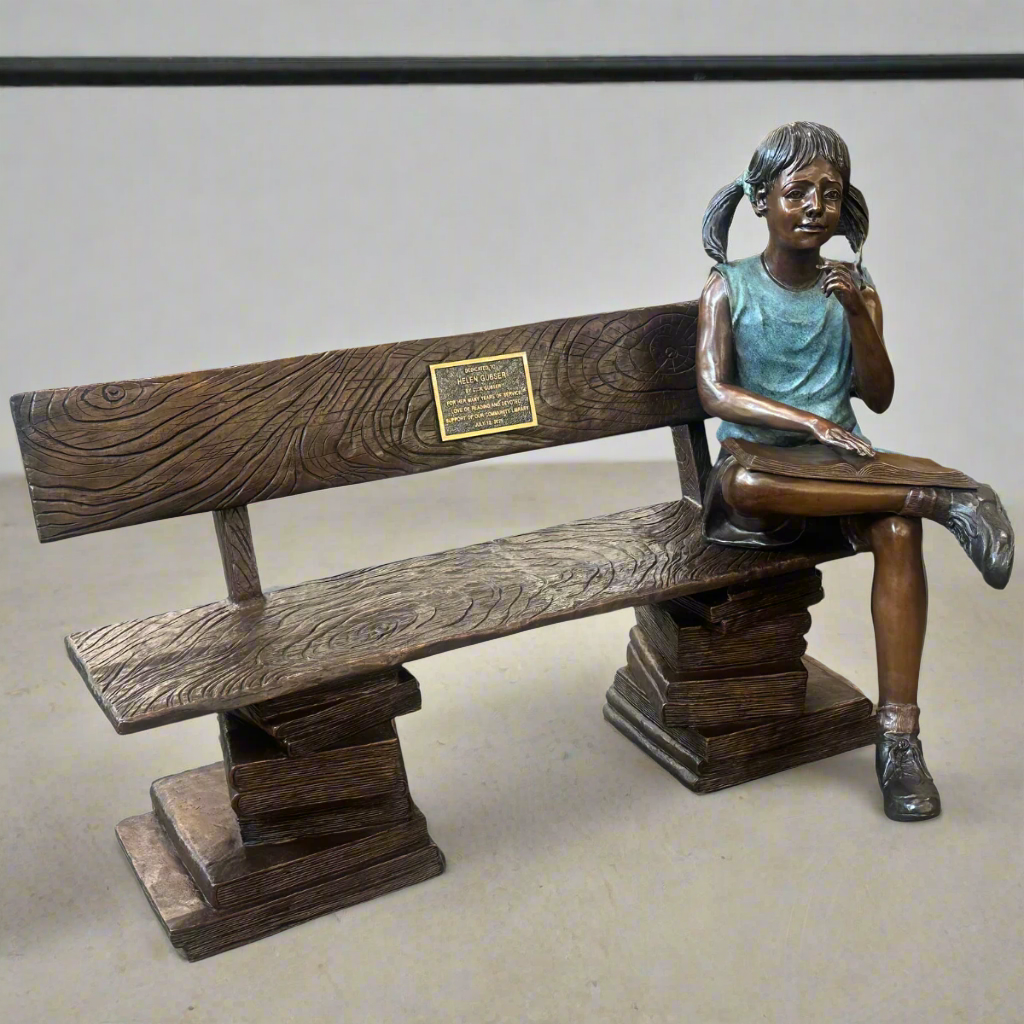 Contemplative Girl Statue on Bronze Book Buddy Bench