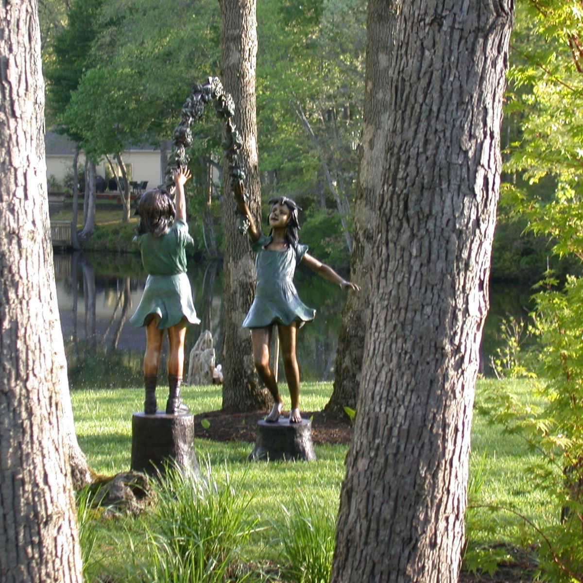 Children's Bronze Garden Statue of Two Girls with a Flower Arbor