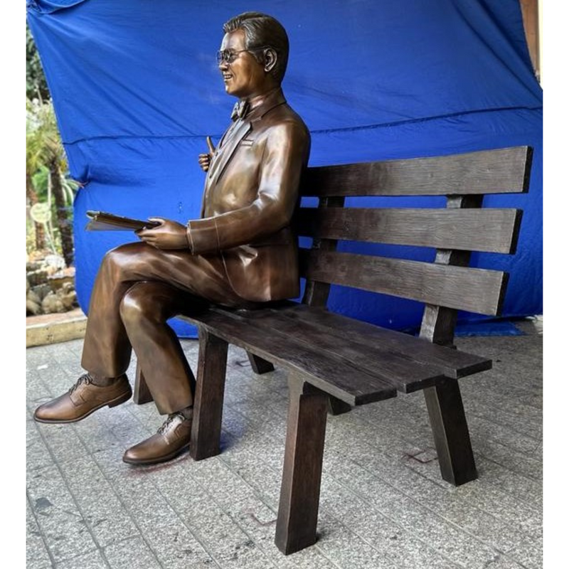 Man Sitting on Park Bench with Newspaper, Michael Yun