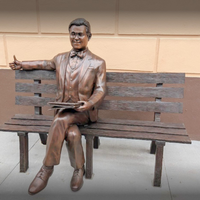 Man Sitting on Park Bench with Newspaper, Michael Yun