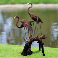 Pair of Herons on Tree Stump