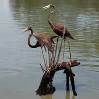 Pair of Herons on Tree Stump