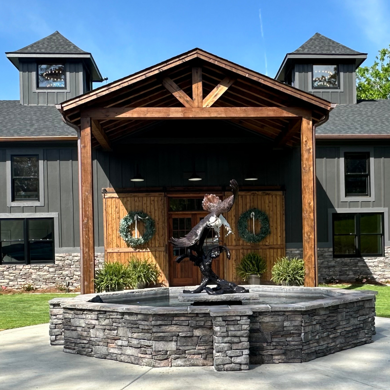 Bronze Osprey Bird Statue at Verbena, AL in front of the Osprey Wedding Venue 