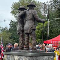 Foley Brothers Pair of Custom Bronze Firefighter Statues