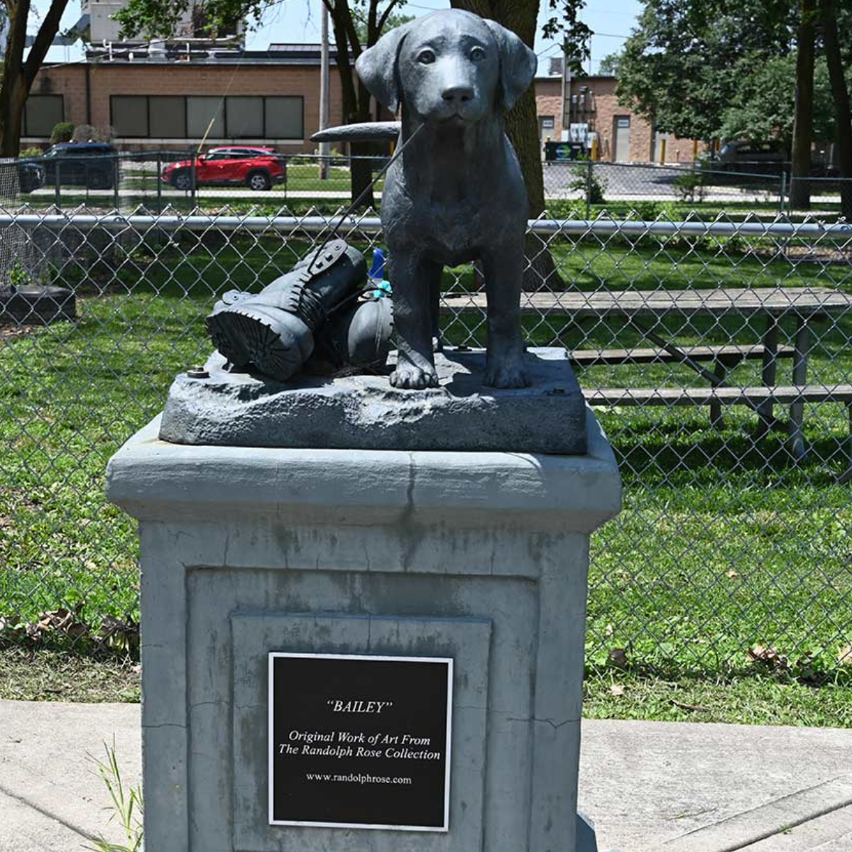 Life-size Labrador Puppy Dog Statue with Boot Laces in Mouth