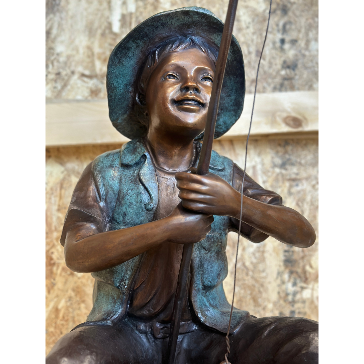 bronze child with a fishing pole Bronze Boy Gone Fishing Statue