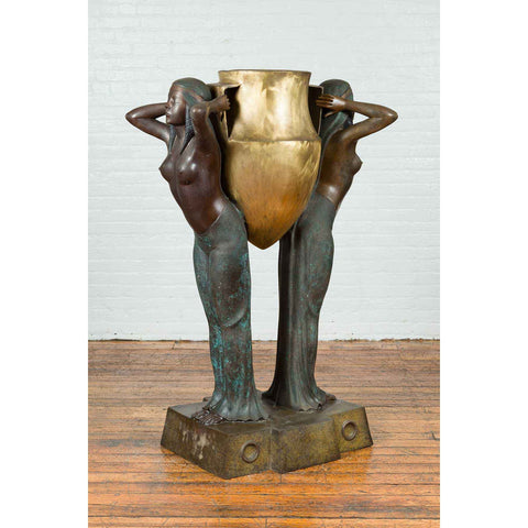 Bronze Egyptian Style Planter Depicting Two Maiden Carrying a Large Urn