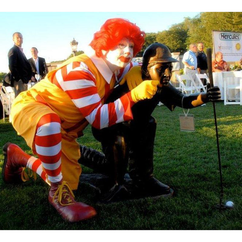 Bronze Statue of a Man Playing Golf with Ronald McDonald