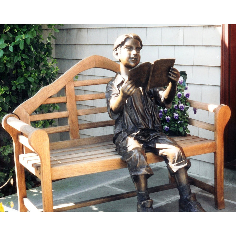 Bronze Statue of a Boy Reading a Book