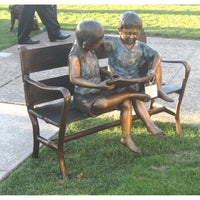 boy and girl reading a book bronze sculpture for library