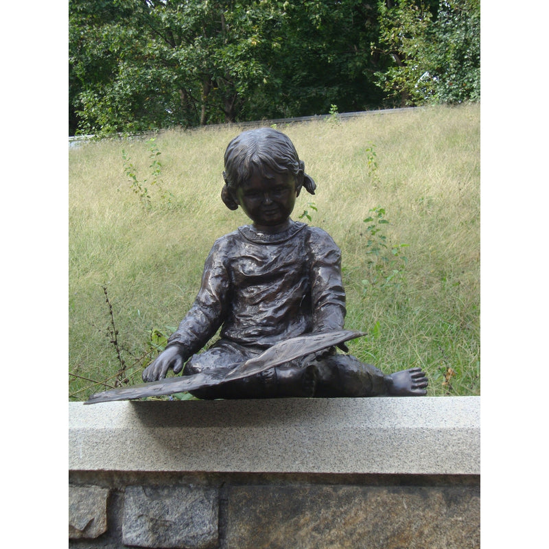 Bronze Statue of a Young Girl Reading a Book