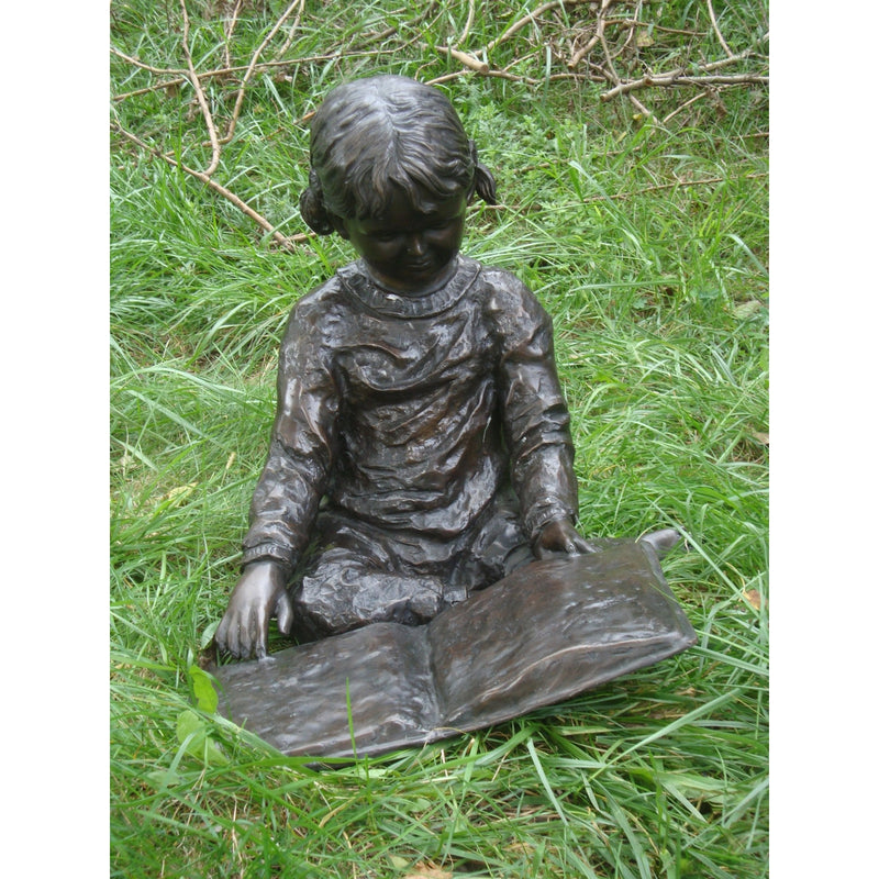 Bronze Statue of a Young Girl Reading a Book