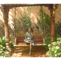 Bronze Statue of a Girl Reading a Book