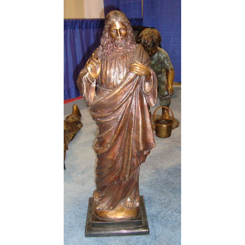 Bronze sculpture of Jesus teaching
