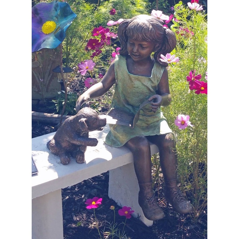 Bronze Statue of a Girl Reading a Book with a Puppy Dog