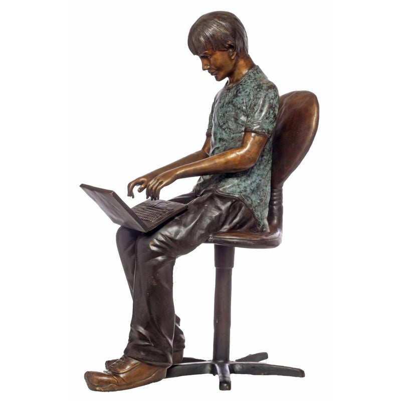 Bronze Statue of Boy Reading Laptop