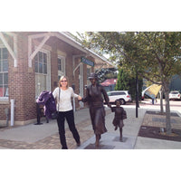 Custom Bronze Sculpture of a Train Conductor with Mother and Child
