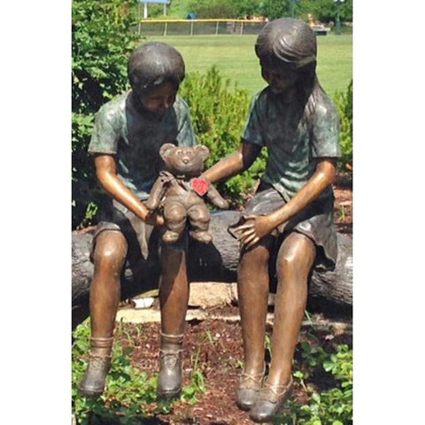 Custom Sculpture of Children on Log Holding a Beanie Baby