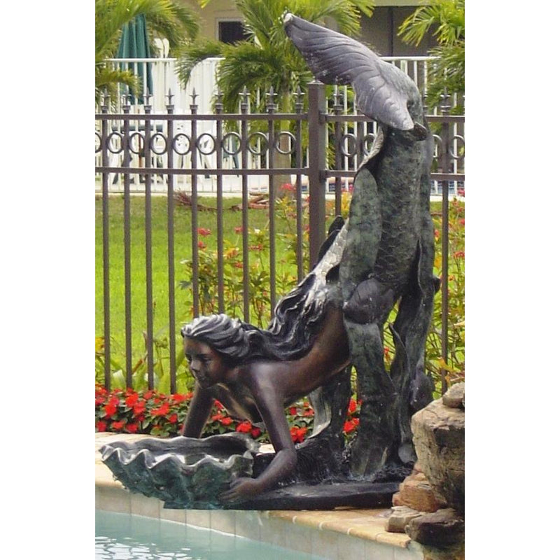 Bronze Mermaid Fountain Shooting Water