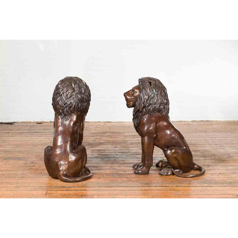 Pair of Sitting Lions with Dark Bronze Patina
