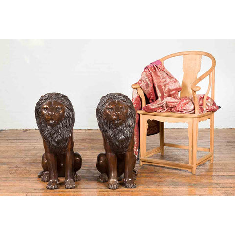 Pair of Sitting Lions with Dark Bronze Patina
