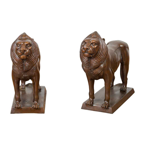 Pair of Bronze Lion Sculptures on Bases with Dark Patina