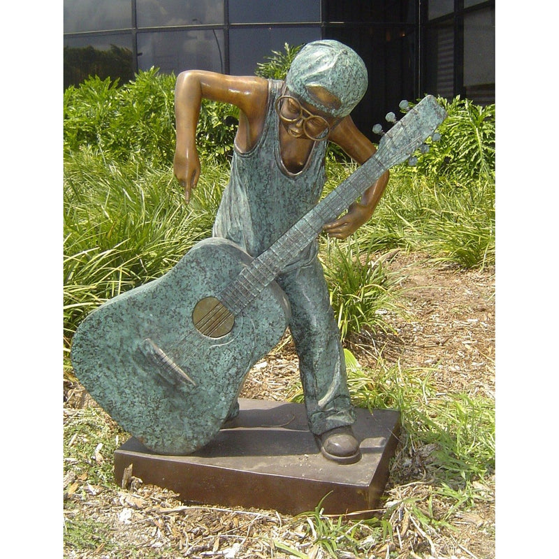 Bronze Statue of a Boy with a Guitar