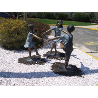 Bronze Statue of a Boy and Two Girls Holding Hands and Dancing in a Circle