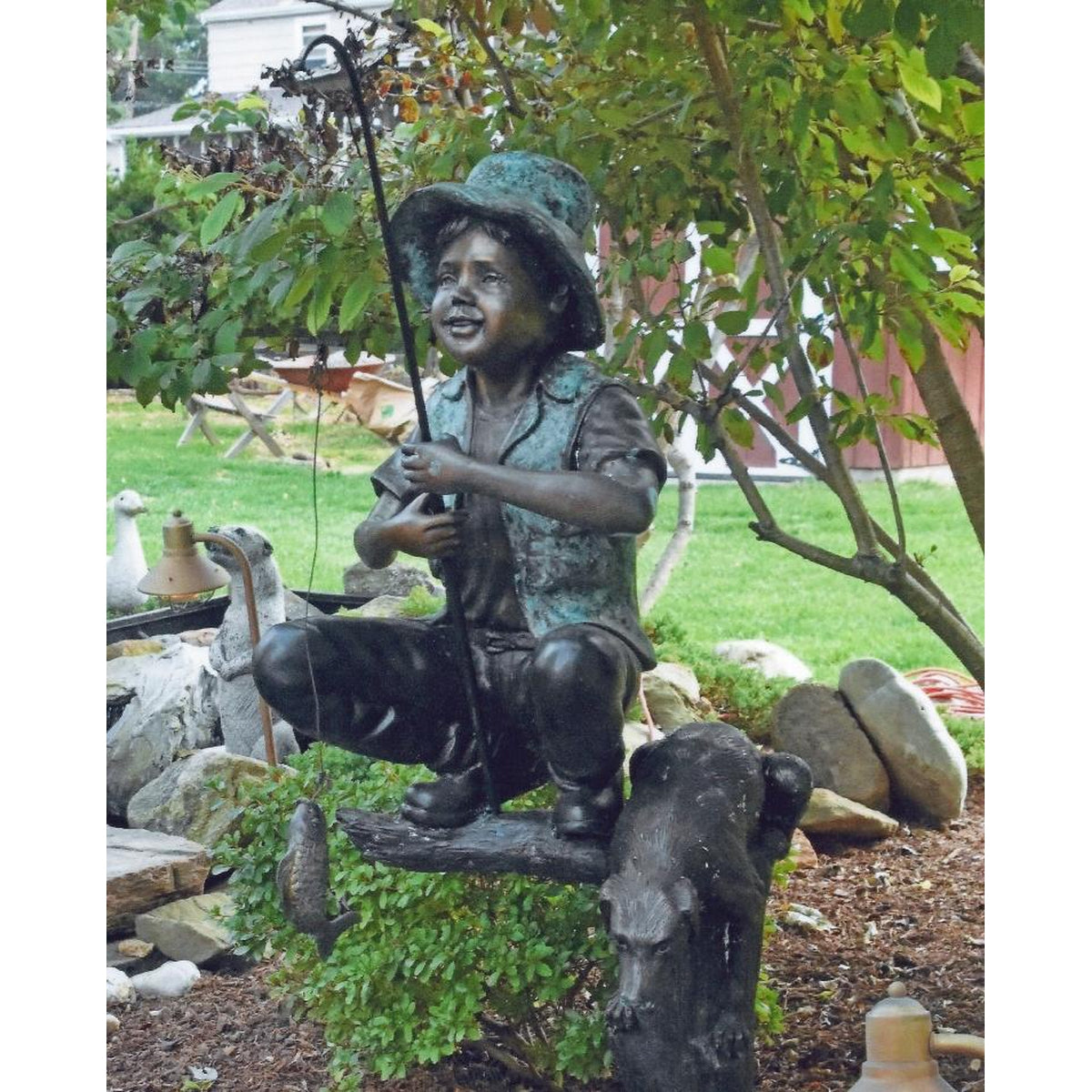 ceramics of little boy holding a fish pole for outdoors Children's Bronze Fishing Statue for Kids