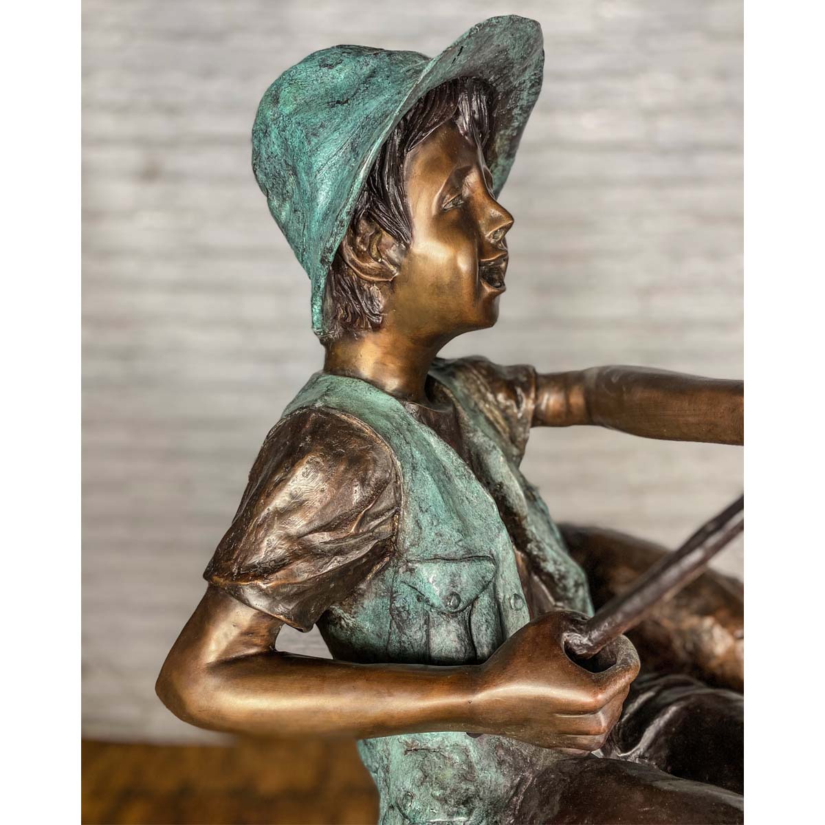 Bronze Statue of a Boy Fishing With His Dog